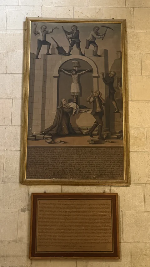 Cuadro al óleo sobre pared de sillería representando una escena milagrosa con obreros y frailes junto al Cristo
